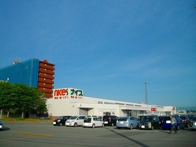 近くのナイス割山店まで1,055m（徒歩14分）