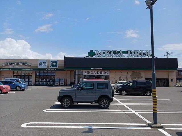 近くのハッピードラッグ佃店まで450m（徒歩6分）