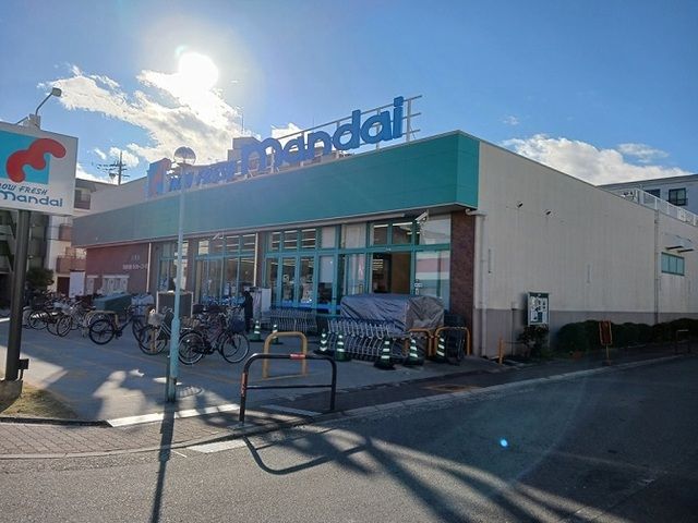 近くの万代八雲店様まで550m(徒歩7分)