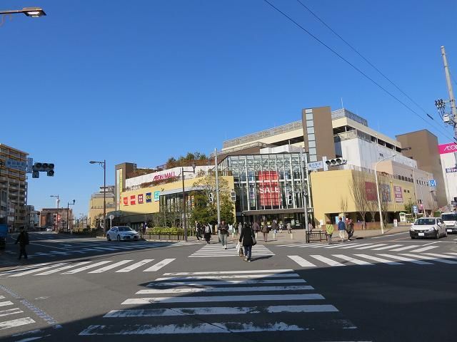 近くのイオン多摩平まで1,100m（徒歩14分）