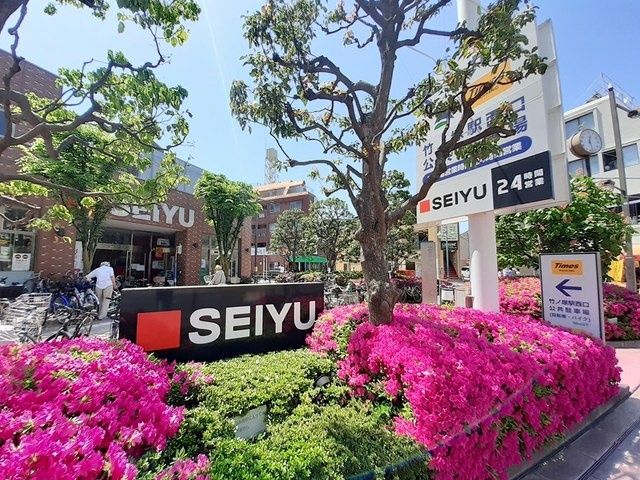 近くの西友　竹の塚店まで495m（徒歩7分）