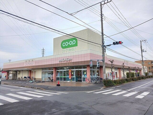 近くのコープ花畑店まで725m（徒歩10分）