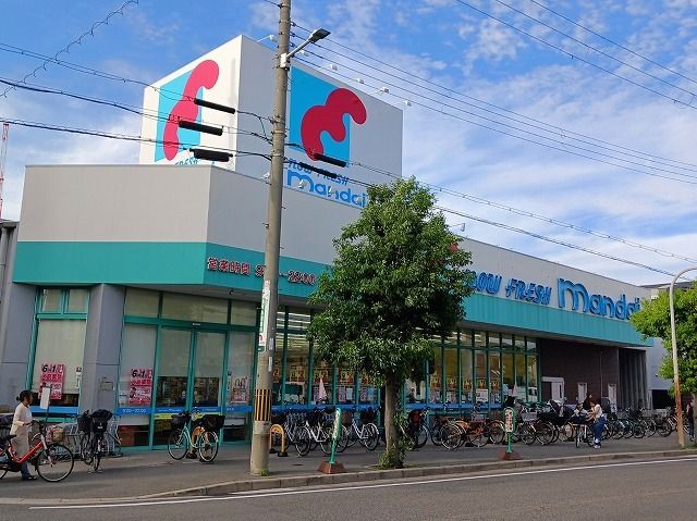 近くの万代 巽西店まで670m(徒歩9分)