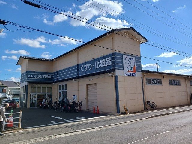 近くのドラッグユタカ 紫竹店まで750m(徒歩10分)