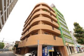 再来しごくビルの外観画像