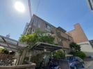 OKAZEN西駅前の外観