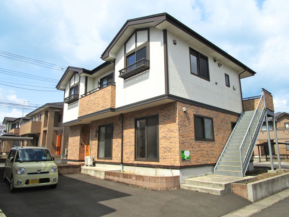 多賀台ヒルズアパート7号棟の外観画像