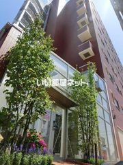 デザイナーズブラウンの部屋 クォーツマンションの外観画像
