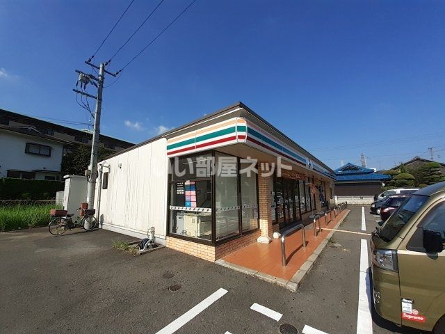 近くのセブンイレブン 生駒北田原町店まで532m（徒歩7分）