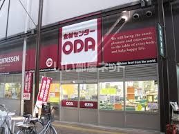 近くの食材センターODA木津市場店まで467m（徒歩6分）