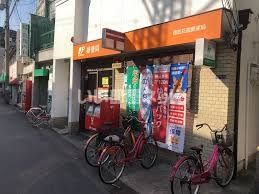 近くの西成花園郵便局まで1,909m（徒歩24分）
