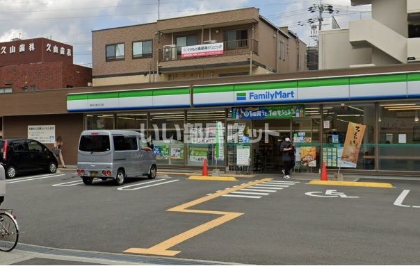 近くのファミリーマート 東淀川南江口店まで324m（徒歩5分）