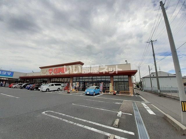 近くのスーパーまで1,115m（徒歩14分）