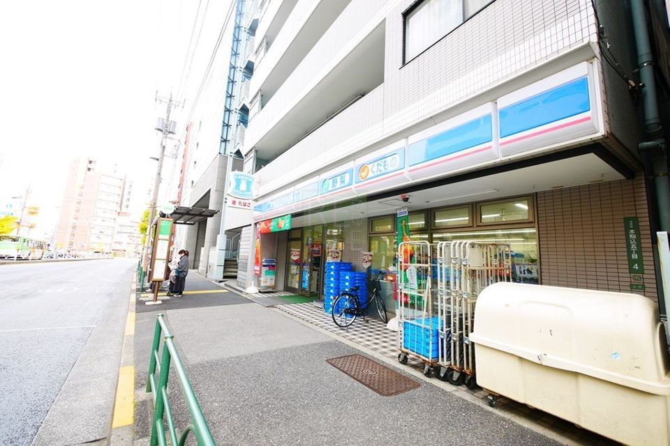 近くのローソン　本駒込五丁目店まで243m（徒歩4分）