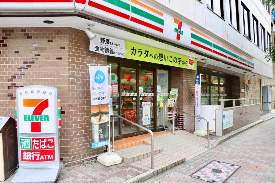 近くのセブンイレブン 中央区明石町店まで221m（徒歩3分）