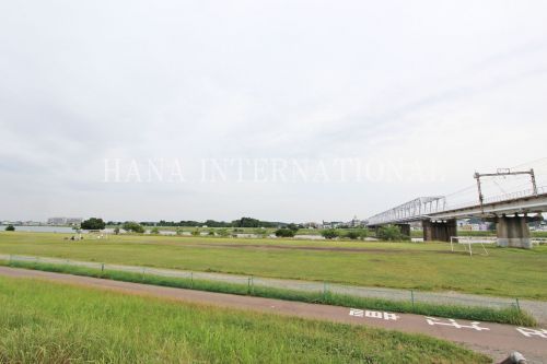 近くの多摩川まで1,133m（徒歩15分）