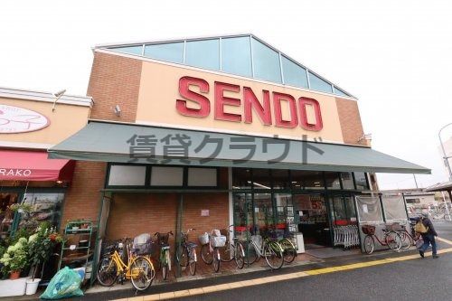 近くのせんどう 八幡店まで209m（徒歩3分）