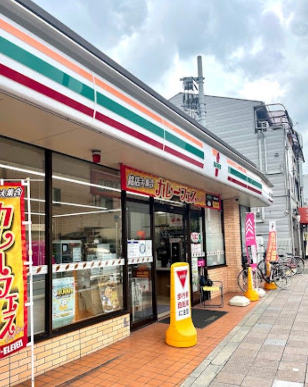 近くのセブンイレブン JR放出駅西店まで128m（徒歩2分）