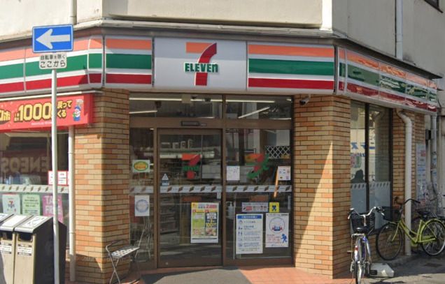 近くのセブン-イレブン 大阪大国町駅北店まで214m（徒歩3分）