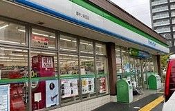 近くのファミリーマート 豊中上新田店まで1,049m（徒歩14分）