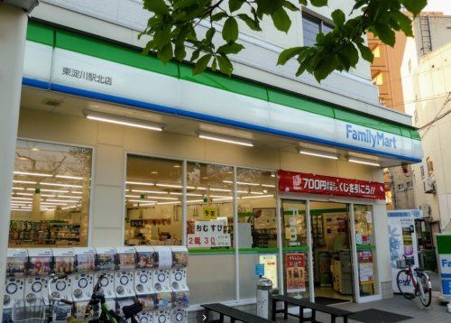 近くのファミリーマート 東淀川駅北店まで519m(徒歩7分)
