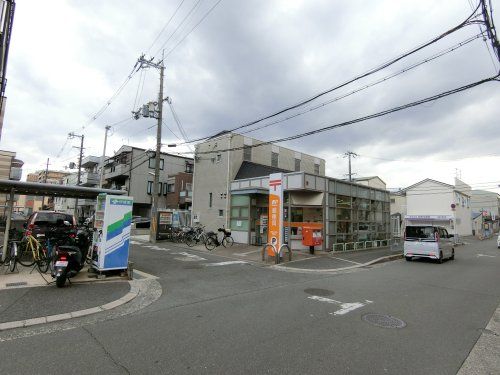 近くの寝屋川神田郵便局まで887m（徒歩12分）