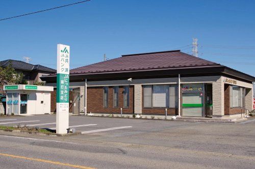 近くのJAにったみどり綿打支店まで1,957m（徒歩25分）