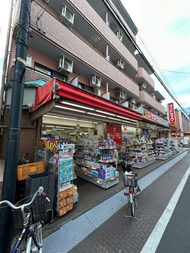 近くのサンドラッグ 一橋学園店まで715m（徒歩9分）