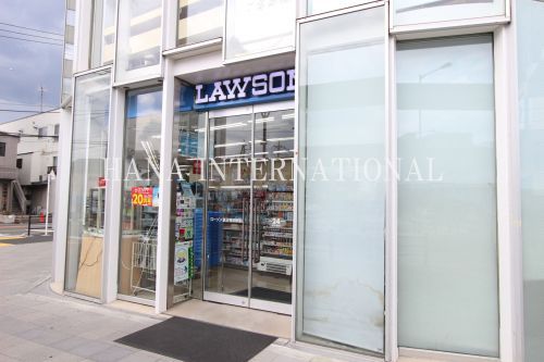 近くのローソン 京王布田駅前店まで557m（徒歩7分）