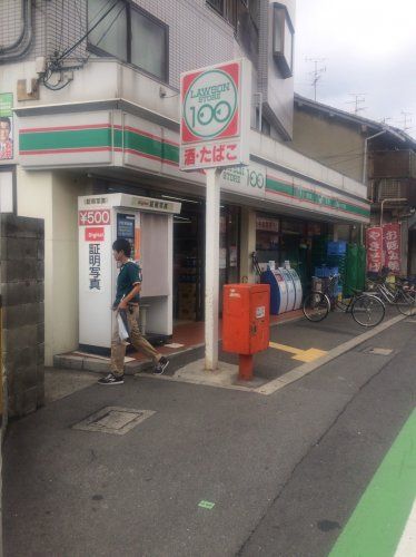 近くのローソンストア100　門真垣内町店まで928m（徒歩12分）