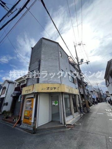 寝屋川市春日町店舗付き住宅の外観画像
