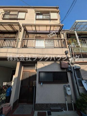 寝屋川市高柳2丁目テラスハウスの外観画像