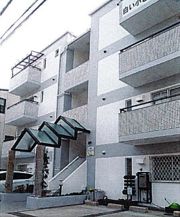 白い小さなマンション六甲の外観画像