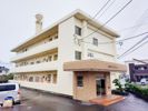 白形マンションの外観画像